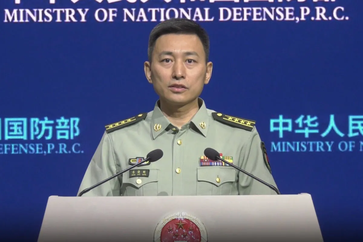 Старший полковник Чжан Сяоган, пресс-секретарь Министерства национальной обороны докладывает о запуске МБР