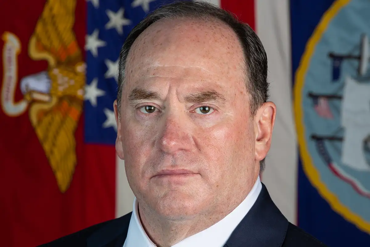 Министр ВМС Джон Картрайт Фелан.